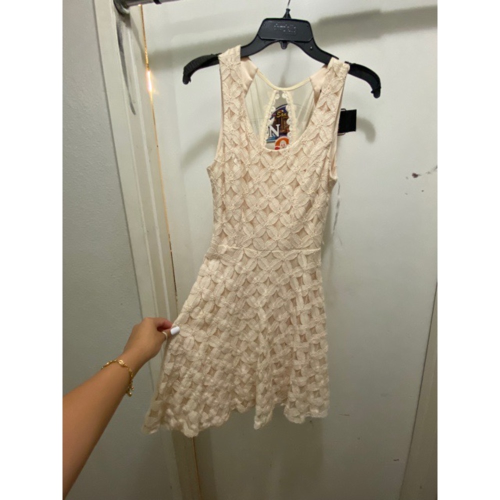 cream floral designed dress